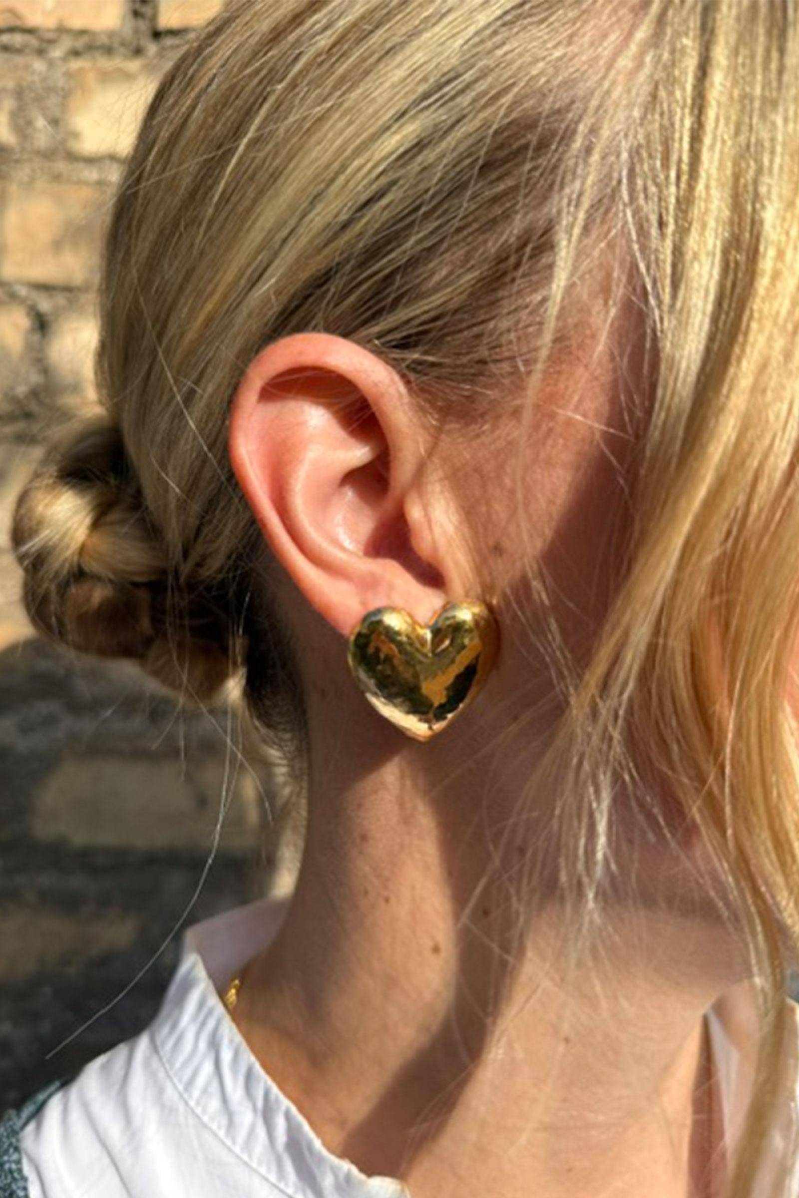 Ohrringe in Herzform Gold